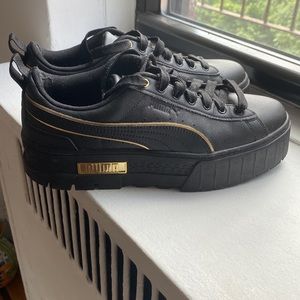 Puma Black Sneakers with Gold Accents